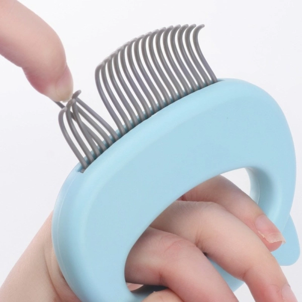 מסרק לטיפוח ועיסוי חתולים